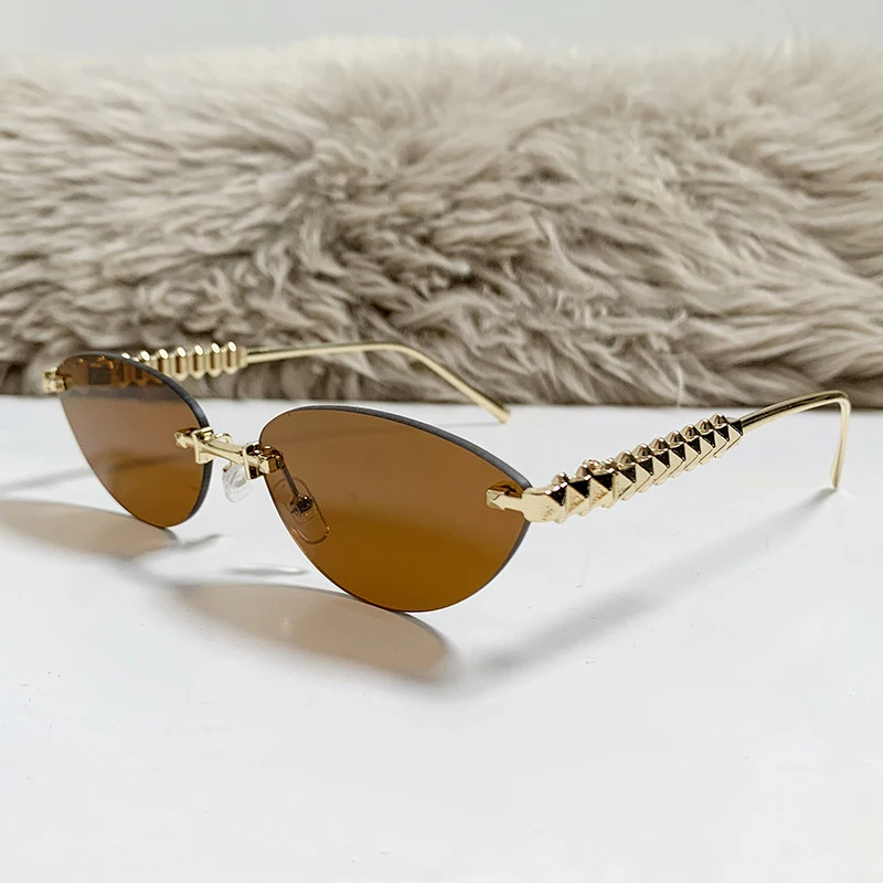 Cat Eye Rivet Rimless Sunglasses Women Luxury 2025 Fashion Brand Oval Narrow Sun Glasses Shades Trendy Elegant Unique Eyewear Cat Eye Rivet Rimless Sunglasses Women Luxury 2025 Fashion Brand Oval Narrow Sun Glasses Shades Trendy Elegant Unique Eyewear KDBazar