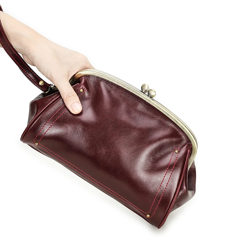 Genuine Leather Women Clutch Wallet Kiss Lock Design Luxury Female Purse Handbag Large Capacity Long Wallet Bag Phone Pocket Genuine Leather Women Clutch Wallet Kiss Lock Design Luxury Female Purse Handbag Large Capacity Long Wallet Bag Phone Pocket KDBazar