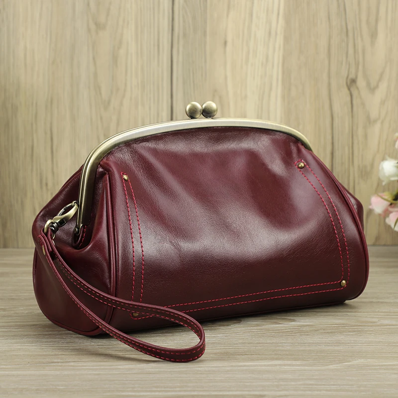 Genuine Leather Women Clutch Wallet Kiss Lock Design Luxury Female Purse Handbag Large Capacity Long Wallet Bag Phone Pocket Genuine Leather Women Clutch Wallet Kiss Lock Design Luxury Female Purse Handbag Large Capacity Long Wallet Bag Phone Pocket KDBazar