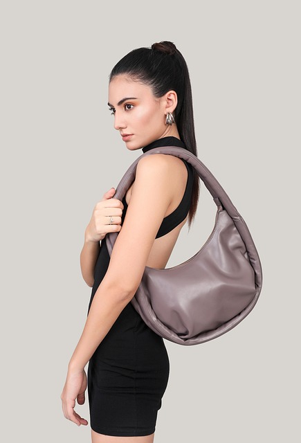 Different types of burgundy bags including totes, crossbody and clutches