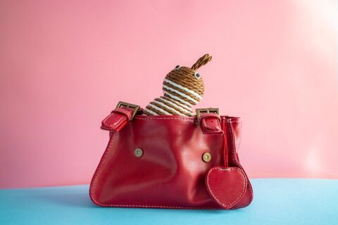 Outfit styled with a burgundy bag for a smart-casual look