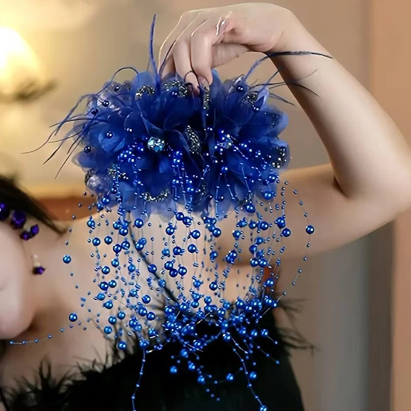 Close up of blue mesh flower hair clip design