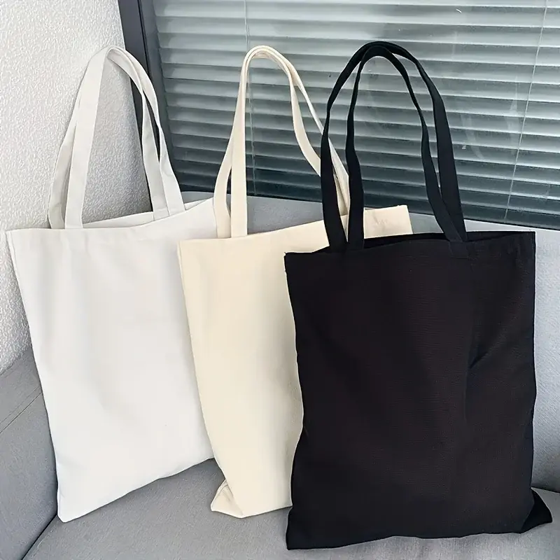White black and cream canvas tote bags
