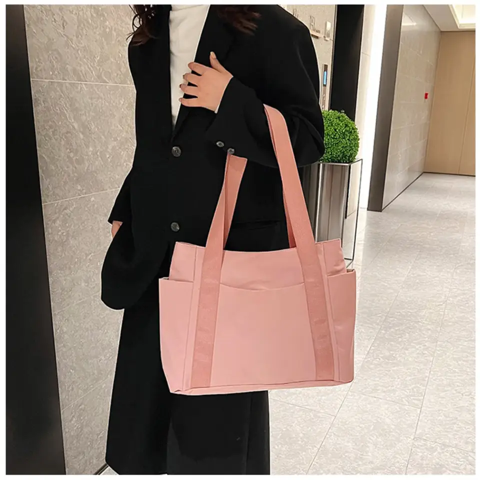 Pink canvas shoulder bag