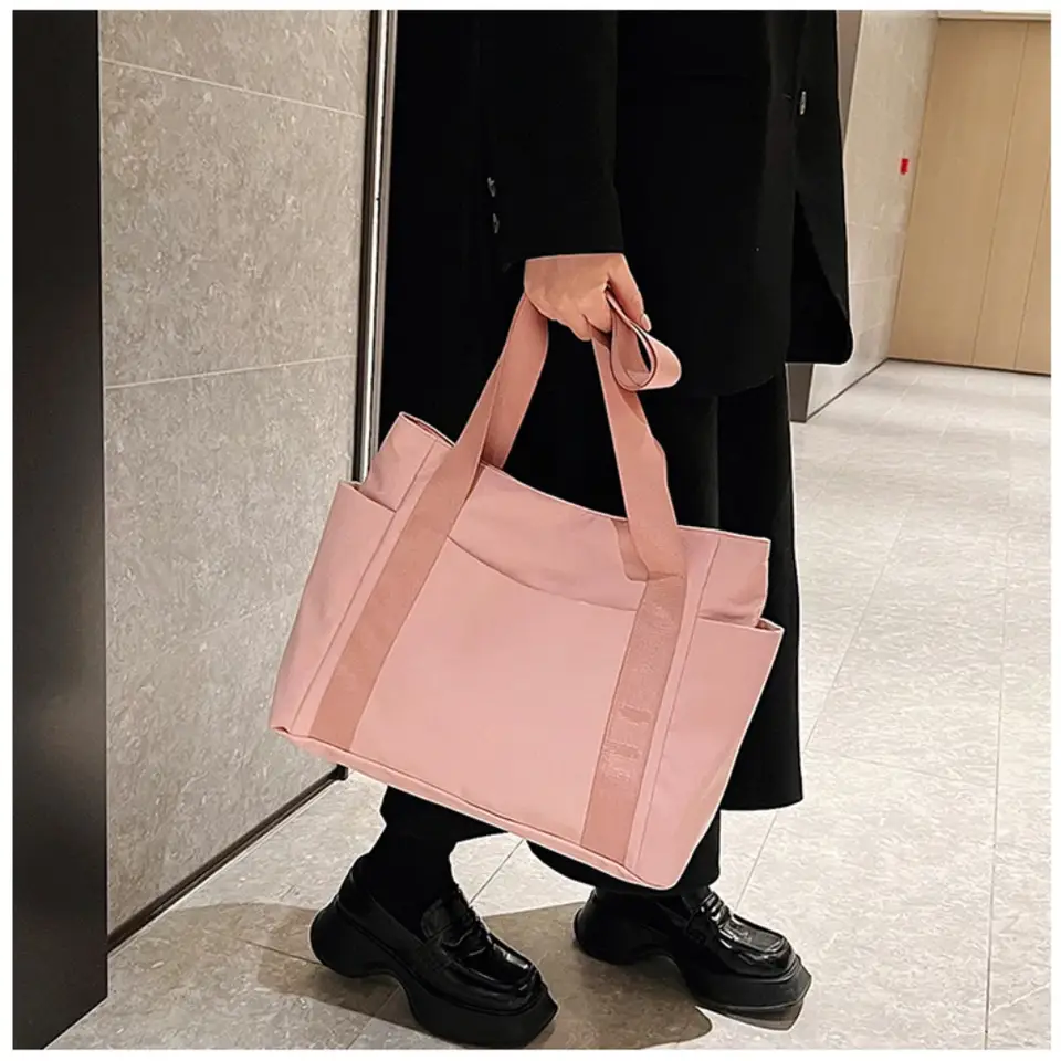 Canvas shoulder bag with pockets