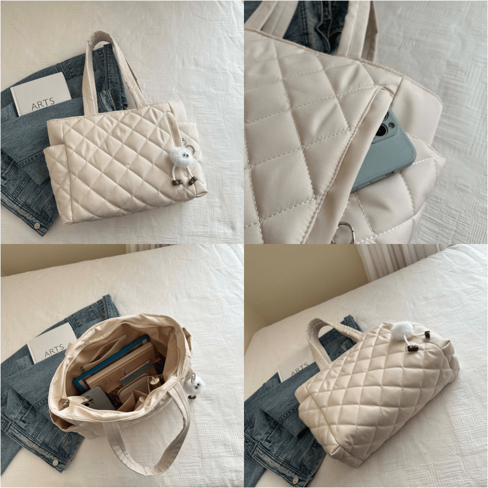 Quilted tote bag charm detail