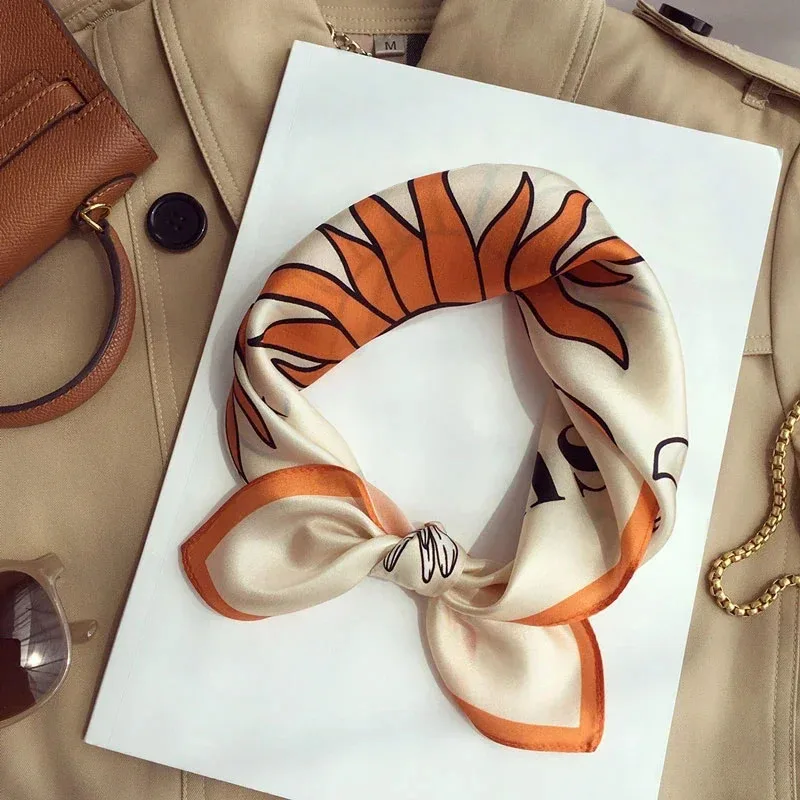 Orange silk scarf folded flat