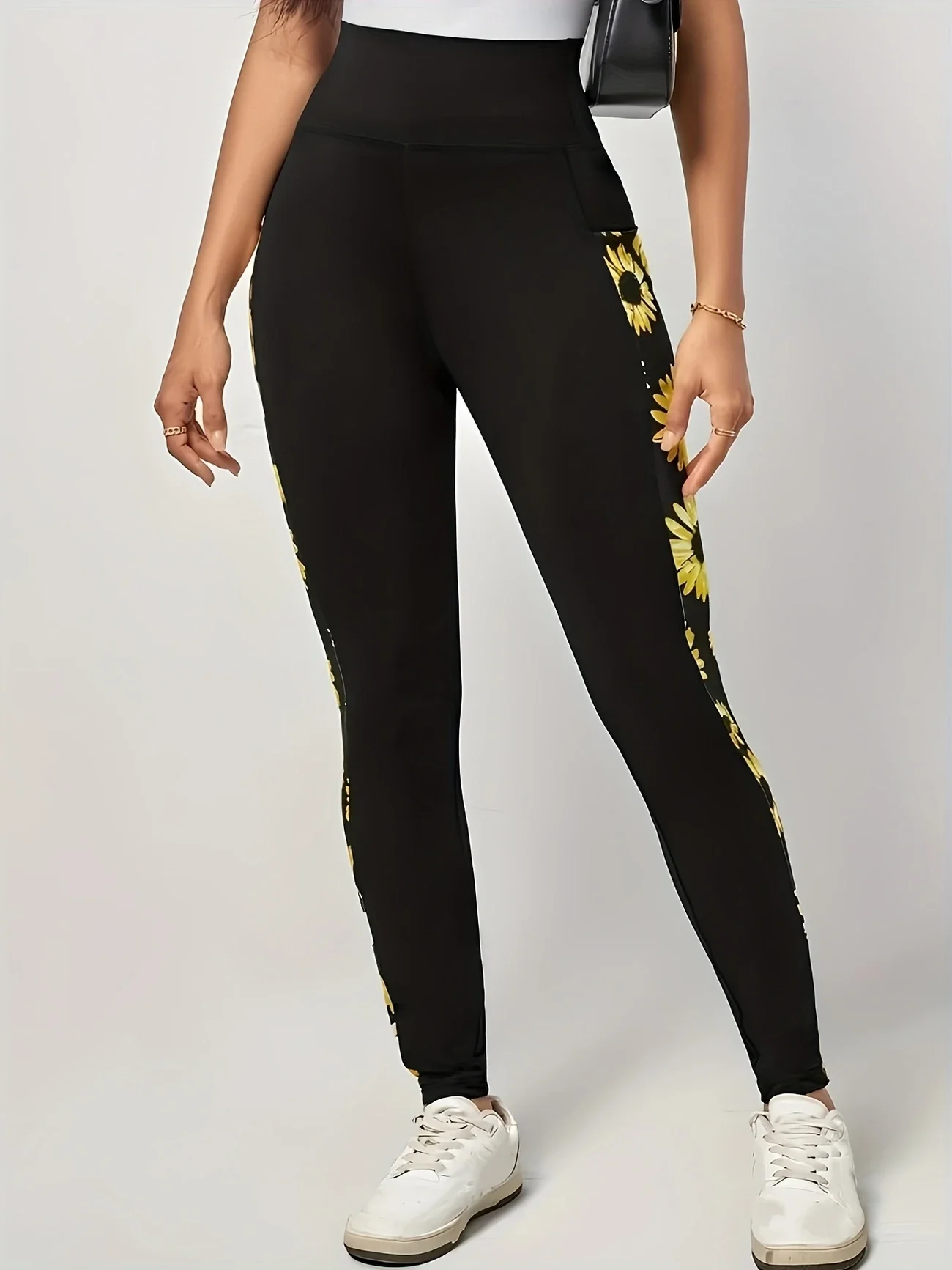 Sunflower print leggings for women, styled casually