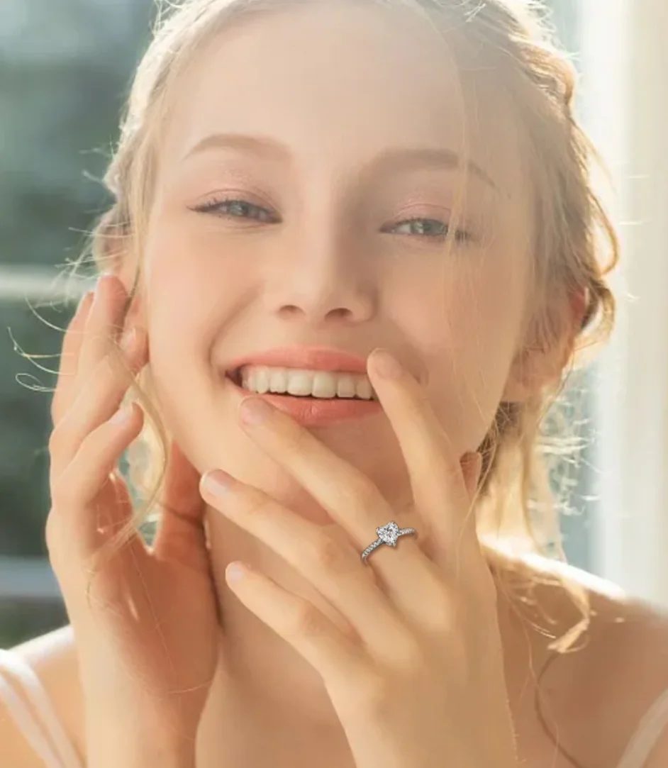 Sterling silver heart zircon ring worn on hand