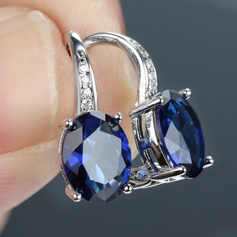 Blue oval CZ drop earrings in sterling silver