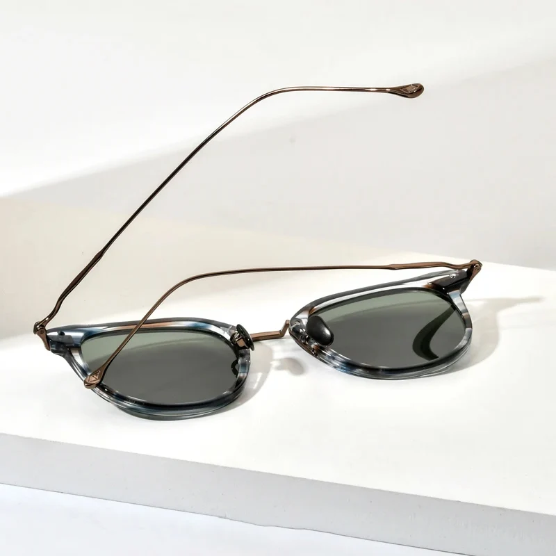 Fonex round titanium sunglasses in tortoise with green lens