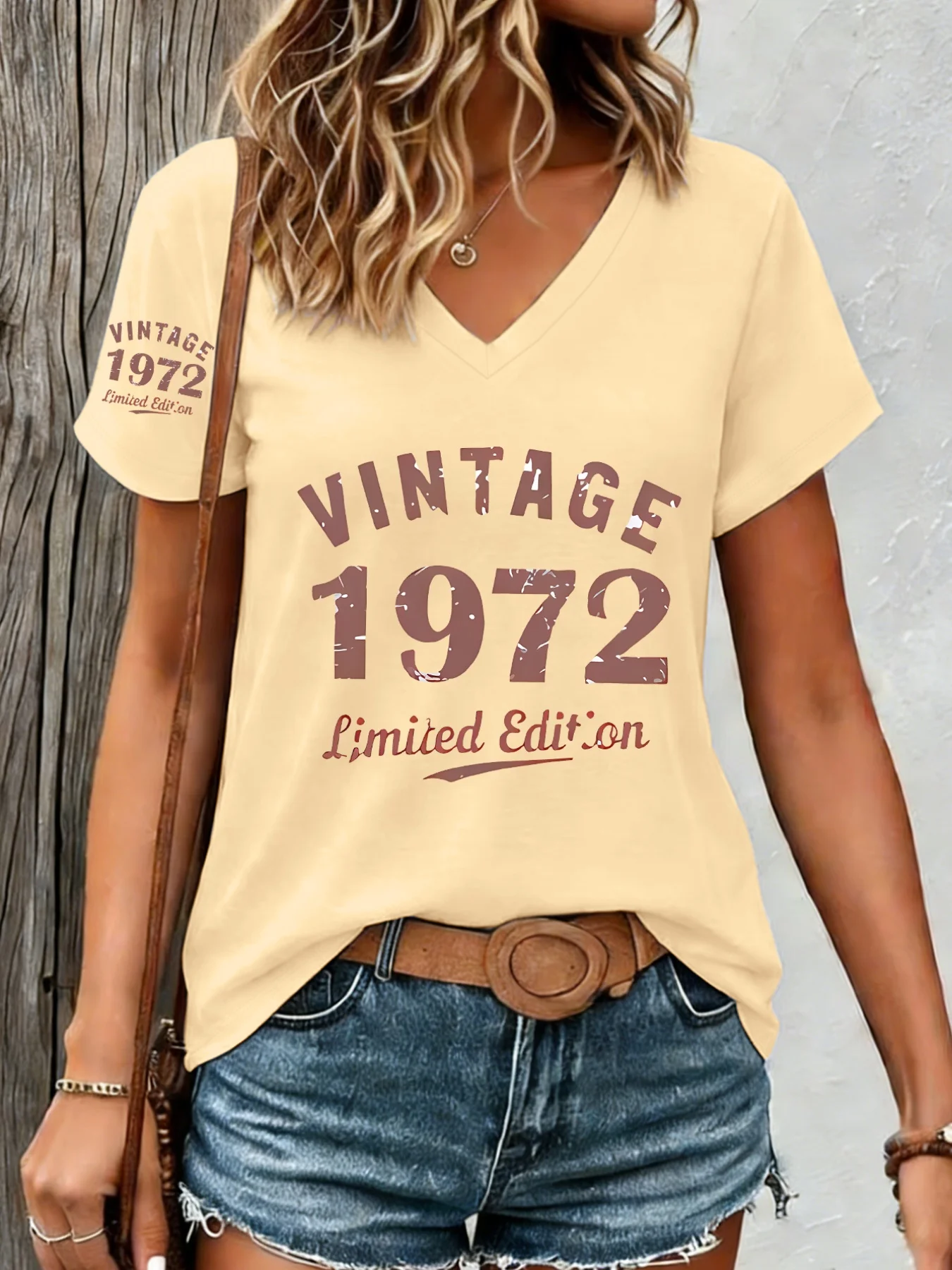 Vintage 1972 graphic t-shirt for women in yellow
