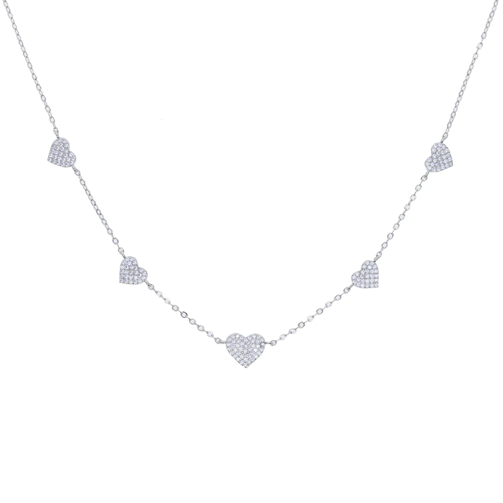 CZ heart necklace styled on model