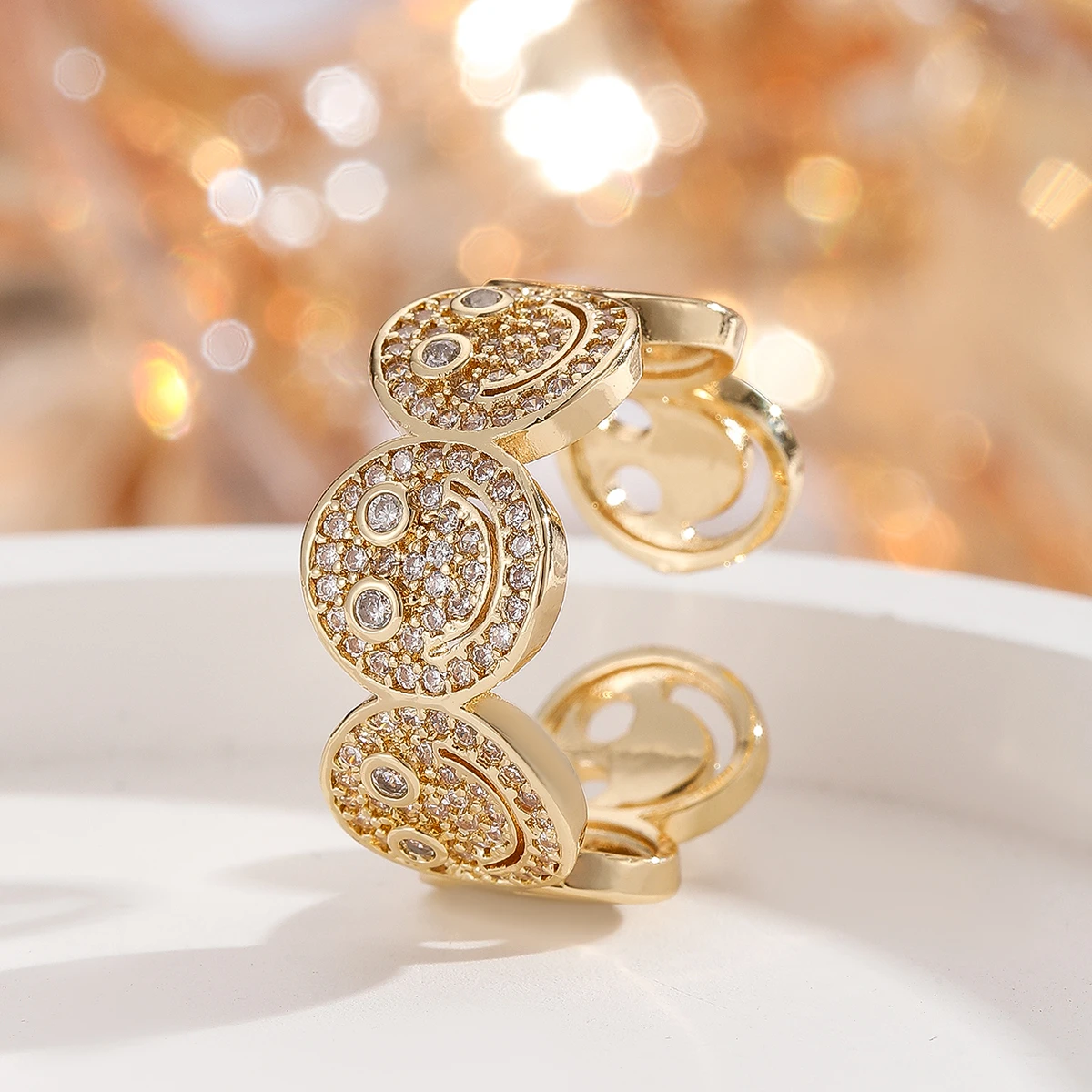 Gold plated smiley bracelet close up