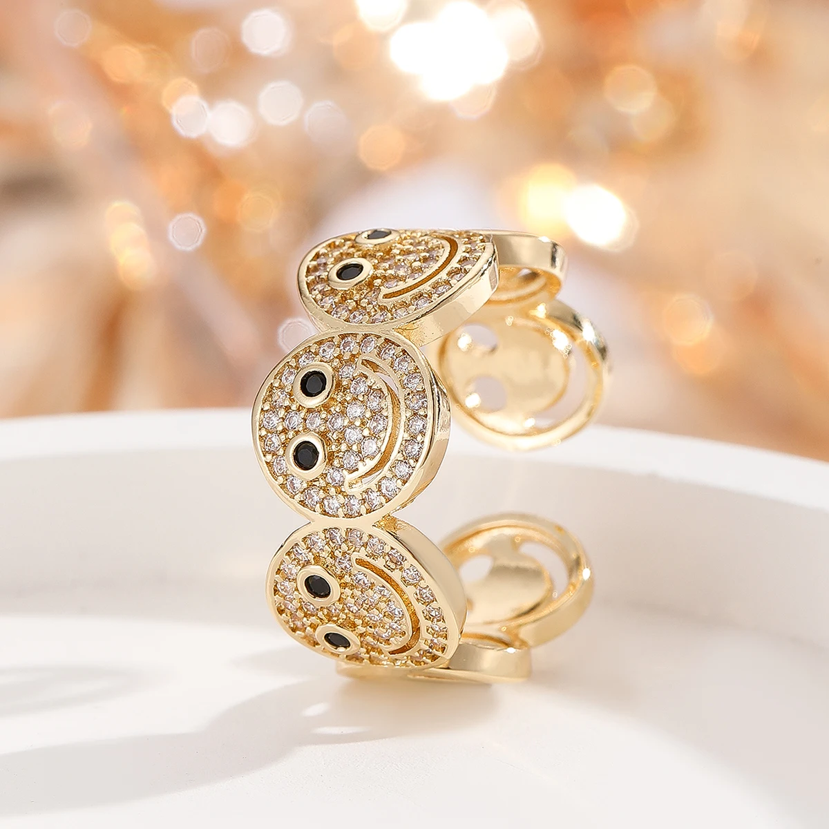 Woman wearing smiley cuff bracelet