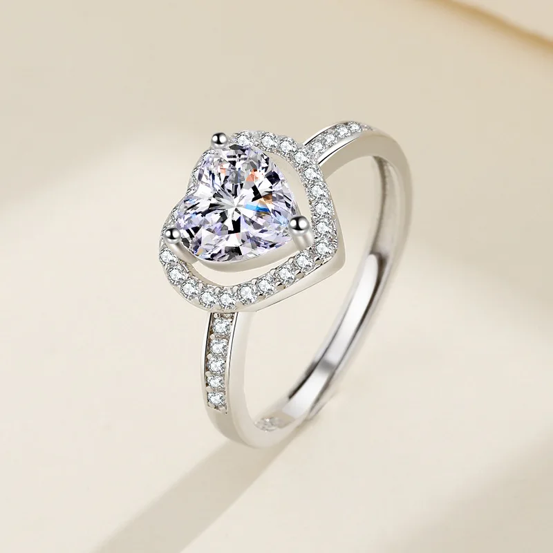 Sterling silver heart sparkle ring on hand
