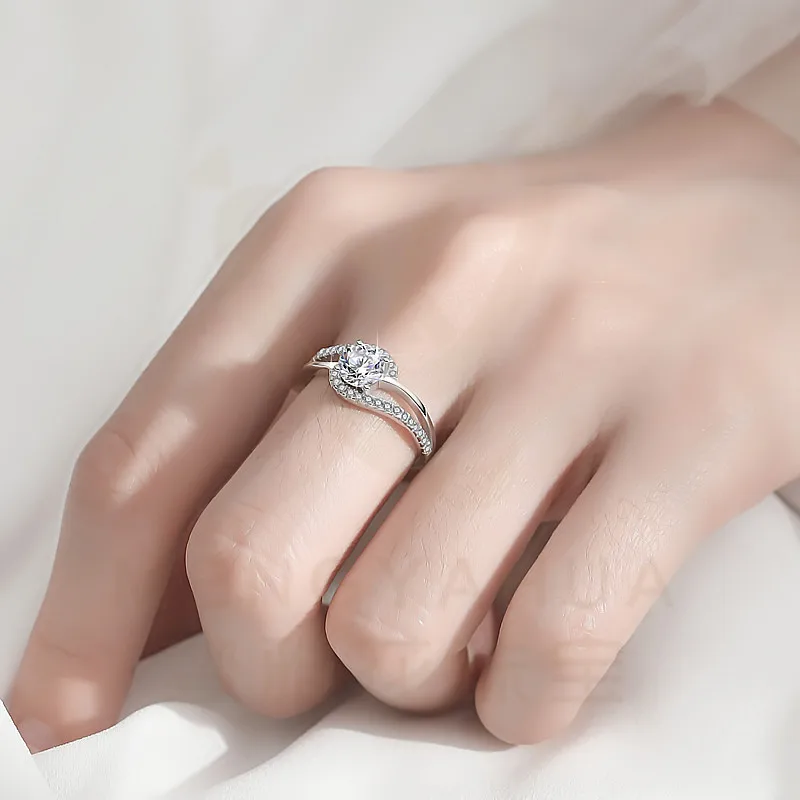 Sterling silver heart ring on hand