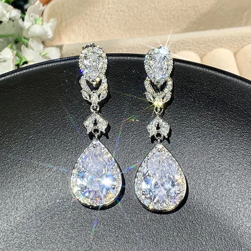 Sterling silver teardrop earrings in jewelry bowl