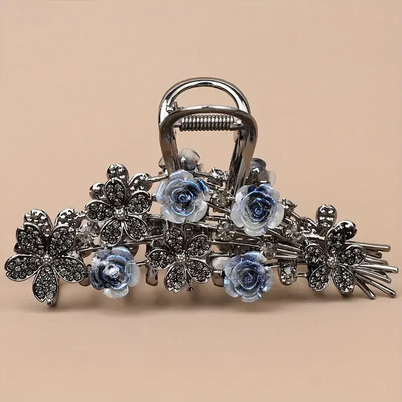 Rose crystal hair claw close up angled view
