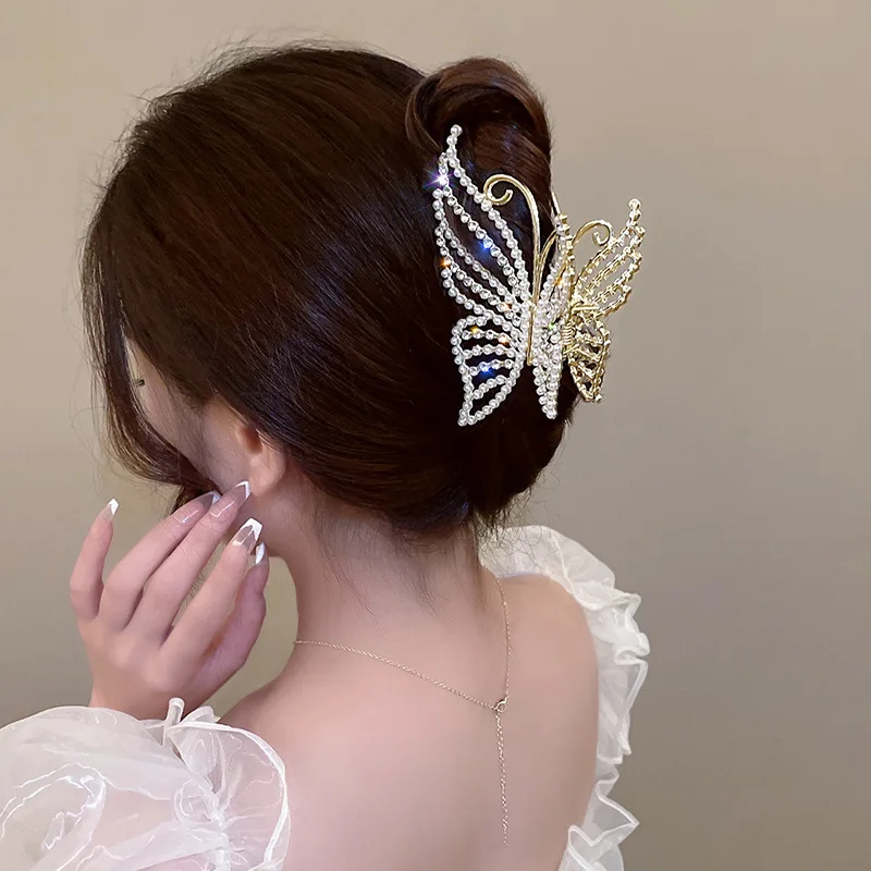 Butterfly hair claw clip on an updo