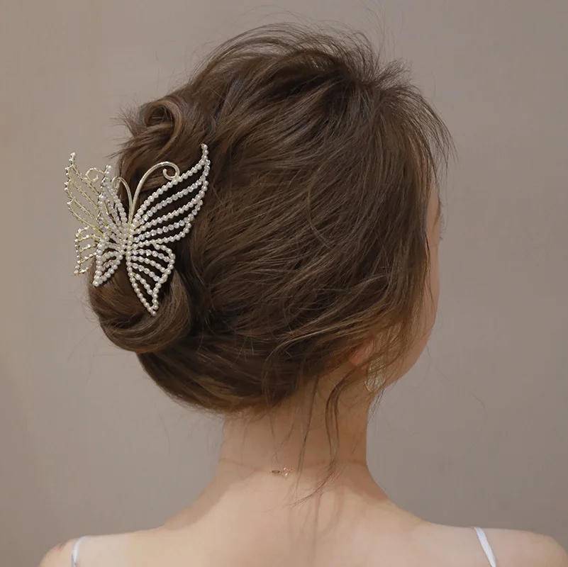 Butterfly hair claw clip styled for a special occasion