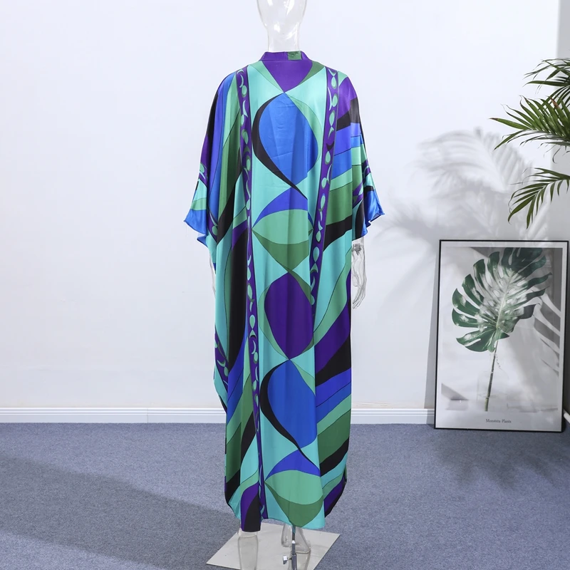 Printed maxi dress styled on beach