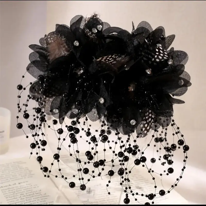 French flower tassel hairpin claw styled in bun