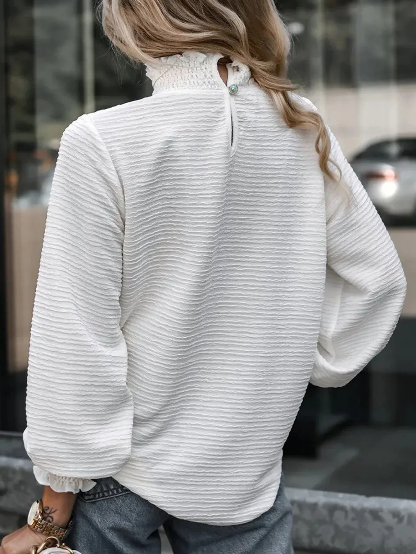 High collar patchwork blouse styled with jeans