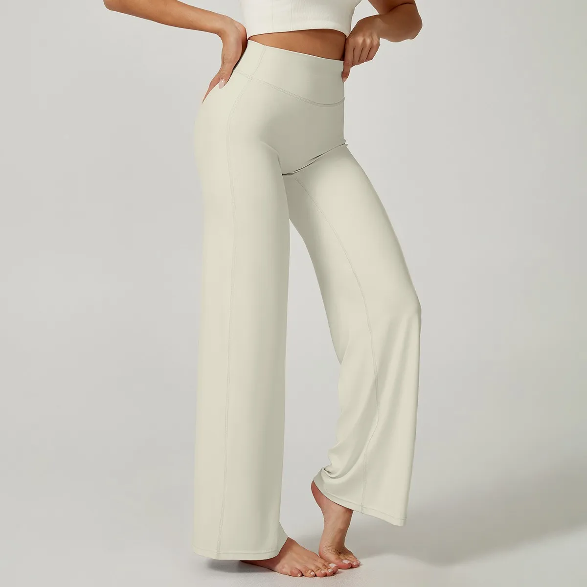 Flare yoga pants for women in cream, side view