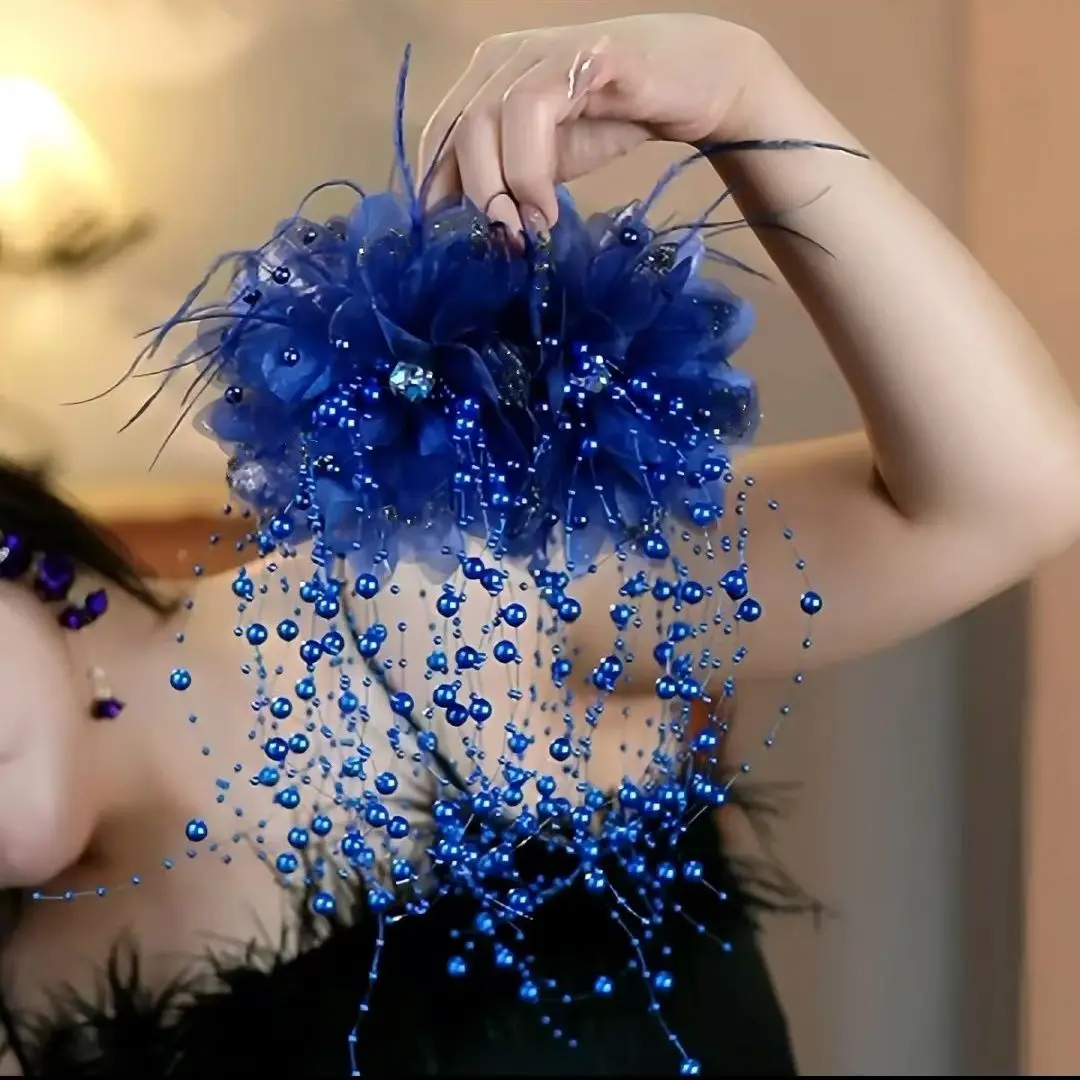 Blue bead tassel flower hair clip close up
