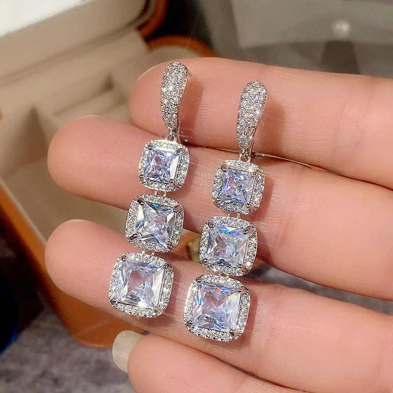 Square drop earrings pair side by side