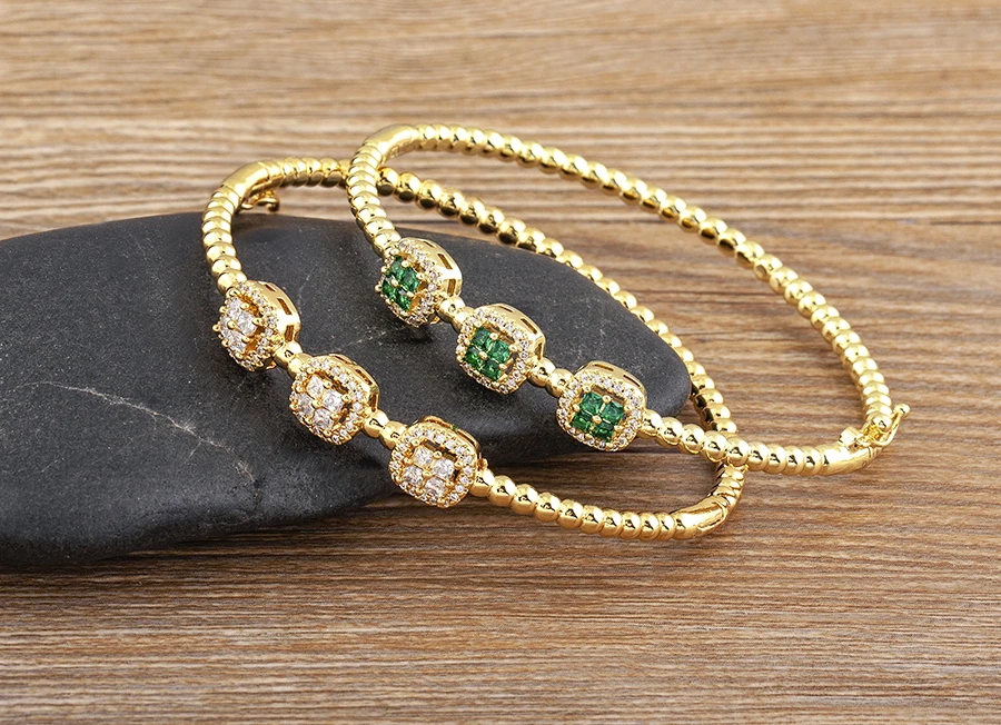 Crystal zircon gold plated bangle bracelet worn on wrist