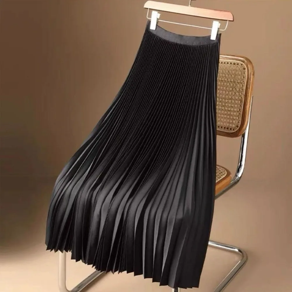 Pleated satin midi skirt waistband detail