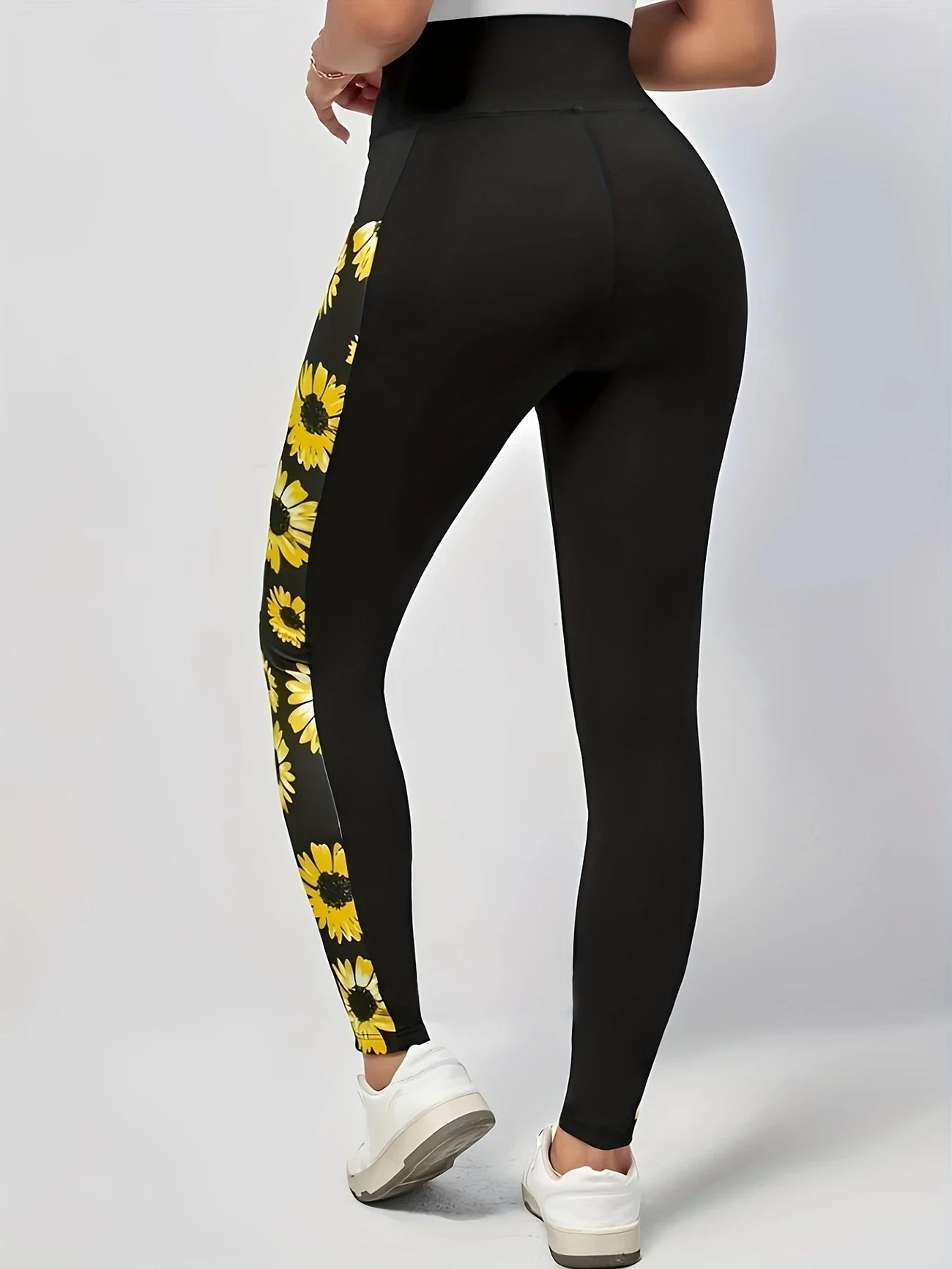 Sunflower print leggings for women, close up detail