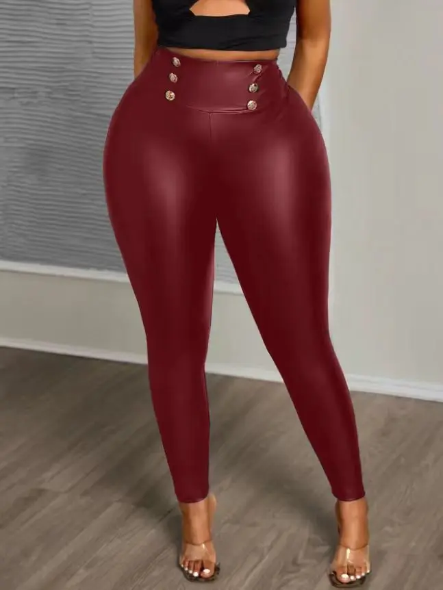 High waisted leather leggings styled with heels