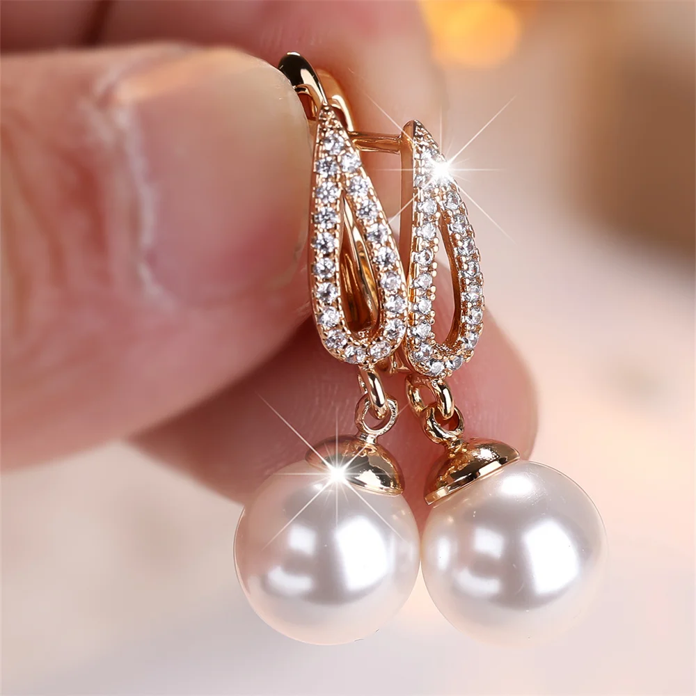 White Zircon Simulated Pearl Tassel Pendant Hoop Earrings For Women Vintage Gold Color Ear Buckle Wedding Jewelry Versatile Gift Earrings Jewelry & Watches White Zircon Simulated Pearl Tassel Pendant Hoop Earrings For Women Vintage Gold Color Ear Buckle Wedding Jewelry Versatile Gift Earrings Jewelry & Watches KDBazar