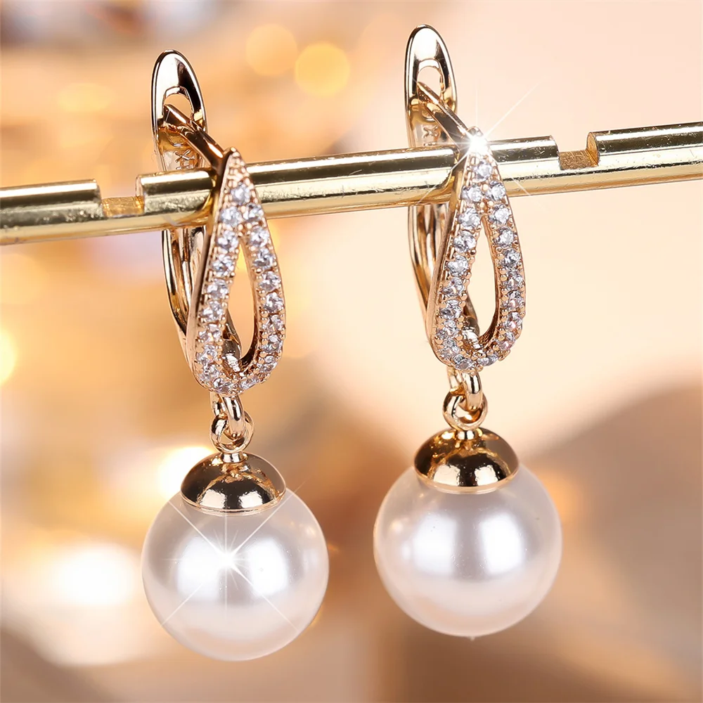 White zircon pearl tassel hoop earrings worn