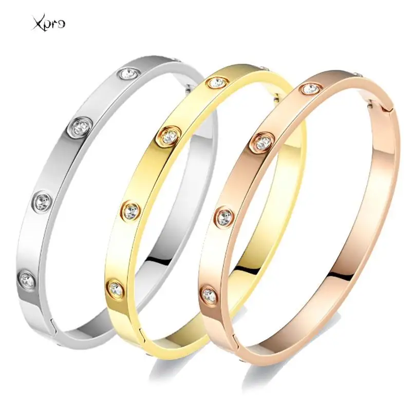 Stainless steel crystal bangle bracelet worn on wrist