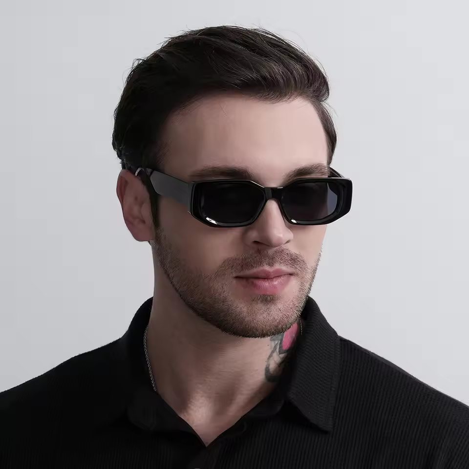 Man wearing retro rectangle sunglasses